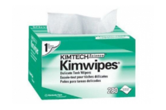 Kimwipes (a type of tissue with less lose fibers) or tongs