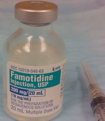 The veterinarian would like you to give famotidine to a 23 kg Doberman Pinscher that has been hospitalized for vomiting. The dosage is 0.5 mg/kg. Using the image, how many milliliters you will be administering?