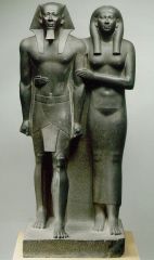 Formal Analysis: King Menkaura and queen, Egypt / Old Kingdom Fourth Dynasty, 2,490-2,472 BCE, diorite, #18
 
Content: 
-4' 8"
-The one foot stepping forward (symbolic)
-funerary piece
-modeled after the wealthy 
-queen is wearing flax linen, but ...