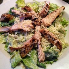 *Romaine lettuce tossed with our made in house Caesar dressing and 8 croutons then topped with an 8 oz marinated and grilled chicken breast.
*Garnish:
Caesar dressing
Parmesan cheese
*Served in a frozen/chilled small bowl.