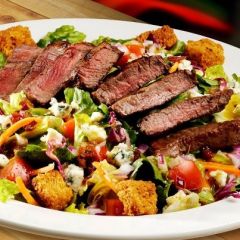 *Salad greens topped with Italian dressing, tomatoes, bleu cheese crumbles, 8 made in house croutons, red onion, bacon bits, and 2 Filet Medallions (cooked to guests liking) cut into 8 slices.
*Garnish
Bleu cheese dressing
*Served in a frozen/chil...