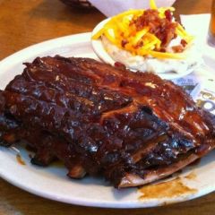 *6-7 Bone portionAll ribs are covered in our signature BBQ sauce unless a guest requests otherwise. comes with 2 sides*Garnish:Wet nap.*Served on a large warm oval