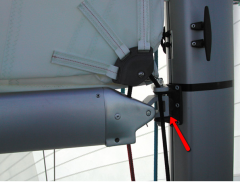The swivel connection (articulated fitting) connecting boom to mast. The boom moves from side to side and up and down by swiveling on it.