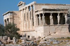 Greece, Classical Era (Ionic) and it was the only Greek temple that was asymmetric and had three porches.

It also had women as the columns known as the Caryatids 

