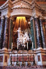 The Ecstasy of Saint Teresa is a white marble sculpture that was created by Gian Lorenzo Bernini. 

Medium:	Marble

The sculpture was commissioned by a Venetian Cardinal and was completed in 1652.