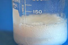 Is the mixing of baking soda (sodium bicarbonate) and vinegar (acetic acid) a chemical or physical change?