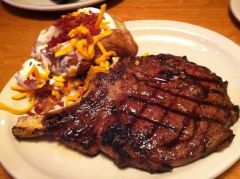 *20 oz.
Most flavorful steak made even more so by leaving it on the bone. 
Garnish:
*Brushed with melted butter.