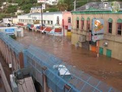 Definition: a large waterfall, a flood
 
Sentence: In the horrible storm Nogales flooded with a cataract of rain.
