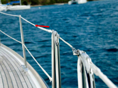 Lines attached to the stanchions to help prevent the crew from going overboard.