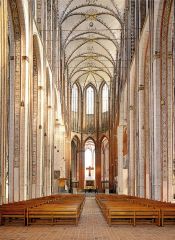 Verticality of French Gothic, vaulted ceiling, decorative colors