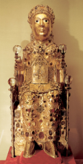 #58


Reliquary of Sainte-Foy


In the Church of Sainte-Foy


_____________________


Content: This is a small (18 - 24") tall statue sculpted from wood, gilded with silver, gold, and inlayed with semi-precious stones. 


___________________


St...