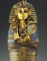 Formal Analysis: Tutankhamun's tomb, innermost coffin, Egypt / New Kingdom 18th Dynasty, 1,323 BCE, gold and precious / semiprecious stones, #23
 
Content:
-King Tut's tomb
-innermost coffin--there are three layers of coffins (all gold)
-housed th...