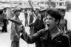 What country did Khmer Rouge party leader Pol Pot commit genocide by killing 2 million people?
