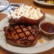 *One 7-8 oz center cut pork chop lightly seasoned and grilled to perfection.
Garnish: 
*3 oz Peppercorn Sauce
*Served on Large Warm Oval