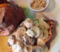*An 8 oz Boneless, NEVER FROZEN, chicken breast, marinated and grilled, then topped with up to 3 of the following:  White gravy, brown gravy,jack cheese, sauteed mushrooms or sauteed onions*Served on Large Warm Oval