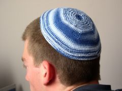 Head covering worn during prayer. Some followers wear it constantly.