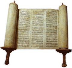 Torah Scroll. The five books of Moses written on parchment and rolled to form a scroll.