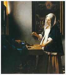#92


Woman Holding a Balance


Johannes Vermeer


1664 C.E.


_____________________


Content: Although there are many smaller, symbolic images put into this painting, the main image is that of a women standing near a box of fine trinkets, holdin...