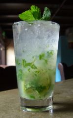 Highball or Pint
 
Built in glass:
Soft handful of mint leaves, slapped around a bit
1 oz Simple syrup
1 oz Fresh lime juice
 Half a spent lime hull  
Gently muddle
 
2 oz White rum
Add ice
3 oz soda
Gentle stir
Garnish w/ mint sprig