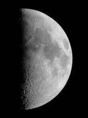 3rd phase of the moon. Half of the moon is illuminated from the right side.