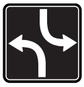 You are driving in the left hand lane and see this sign, what is your action?