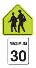 You are travelling at 50 km/hr down a street on Saturday at 1 pm, you see this sign on your route.  Do you need to slow down?