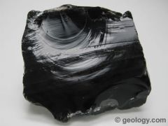 Color: black
Streak: none
Texture: very smooth with sharp edges,breaks with a conchoidal fractures 
Shiny: glassy 
Other: formed from lava, known as "nature's glass"