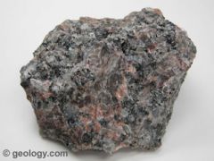 light-colored rock with grains large enough to be visible with the unaided eye.  It  is composed mainly of quartz and  feldspar with minor amounts of mica, amphiboles and other minerals.   This mineral composition usually gives it a red, pink, gra...