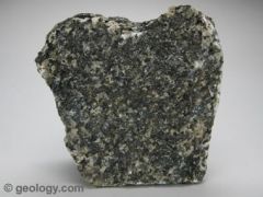 coarse-grained, dark-colored, intrusive rock. It is usually black or dark green in color and composed mainly of the minerals plagioclase and augite.