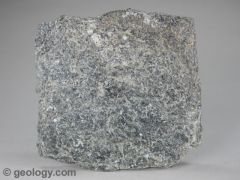 rock with well developed foliation. It often contains significant amounts of mica which allow the rock to split into thin pieces.
