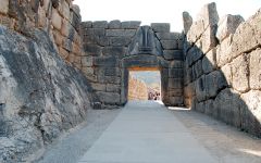A vault formed by the piling of stone blocks in horizontal courses, cantilevered inward until the two walls meet in an arch.

i.e.) The Lion's gate at Mycenae