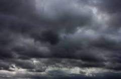 Is a sky full of dark clouds a sign of an impending storm?