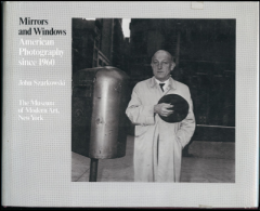 In the 1978 exhibit "Mirrors and Windows Szarkowski divided photography into two categories.  What were they?