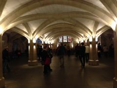 The one directly beneath the Hall dates from the same time as the walls (15th century)

The western crypt dates from the 13th century.