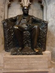 What is the statue of Churchill made of?

What is the name of the sculptor?

When was it unveiled?