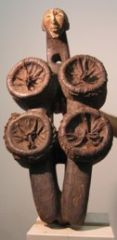 Bellow with Carved Head
Punu
Gabon
19th/20th century
Wood with patina

These are fairly generic among the ethnicities of the Congo basin. They are associated with blacksmiths in that they are used to blow on coals and fan the fire. Although it is ...