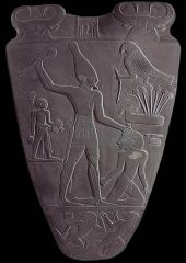 Pallette of King Narmer (Front), From Hierakonpolis. ca. 3150-3125 BCE
     -King Narmer wears the White Crown of Upper Egypt
     -King Raising his Mace/ Emblem of Kingship
      -Composite View/ Hallmark of Egyptian 2D Art
Frontal View: Eye, sho...