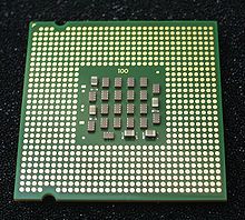Pins are on the MOBO. Found on new type of processor(Intel Sandy Bridge i3,i5,i7, AMD, etc). LGA 1155 vers.