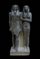 #18
King Menkaura and Queen
- Egypt
- Old Kingdom- Fourth Dynasty
- 2,490-2,472 BCE
 
Content:
- funerary statue of Pharaoh and his queen
- diorite (hard, dense stone)
- made with block-like structure
- polished
 
Style:
- follows the cannon of pr...