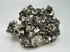 Class: Sulphides
System: Monoclinic
Hardness: 5.5-6
Specific gravity: 5.9-6.2
Luster: metallic
Color: Silvery or whiteish-gray
Cleavage: good cleavage
Streak: Black
Gives off strong odor of garlic when struck by a hammer