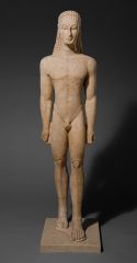 An Archaic statue of a young man or boy. Greek and Aegean.