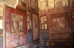 Ixiom room fresco
S: Greek mythological scene, various framed panel paintings
T: rebuilt 62-79 ce
A: unknown
M: fresco 
P: House of the Vettii, Pompeii, 
S: Ancient, Roman