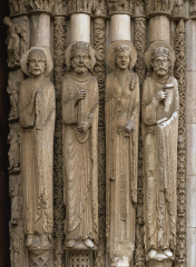 These two sculptures are Gothic.  One comes from the beginning of the Gothic tradition, the other from the end.  Discuss which early Gothic, which is late, is and tell why.