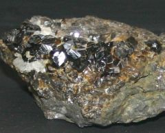 SnO2
- very heavy
- occ. knee-shaped twin crystals
