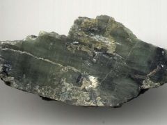 CaMgSi2O6
- 87/93 pyroxene cleavage
- shows basal parting
- colourless to green
