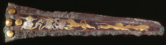 Inlaid dagger blade with lion hunt, from Grave Circle A,Mycenae, Greece, ca. 1600–1500 bce. Bronze, inlaid with gold, silver, and niello