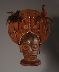 Chihongo Face Mask
Chokwe
Congo or Angola
19th/20th century
Wood, patina, feathers, metal, glass beads

The Chihongo masks are the most prestigious masks of the Chokwe and reserved only for the chief. It gives us insight into Chokwe cosmology and...