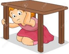 There is scared girl under the table.