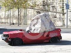 http://www.dreamstime.com/stock-photos-car-crushed-rock-image24877213