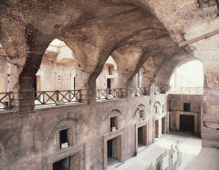 -Imperial Rome, Roman Empire
-brick-faced concrete
-vast multilevel complex of barrel-vaulted
shops and administrative offices
-lit by skylights through groin vaults (first introduced here)
-first covered shopping center